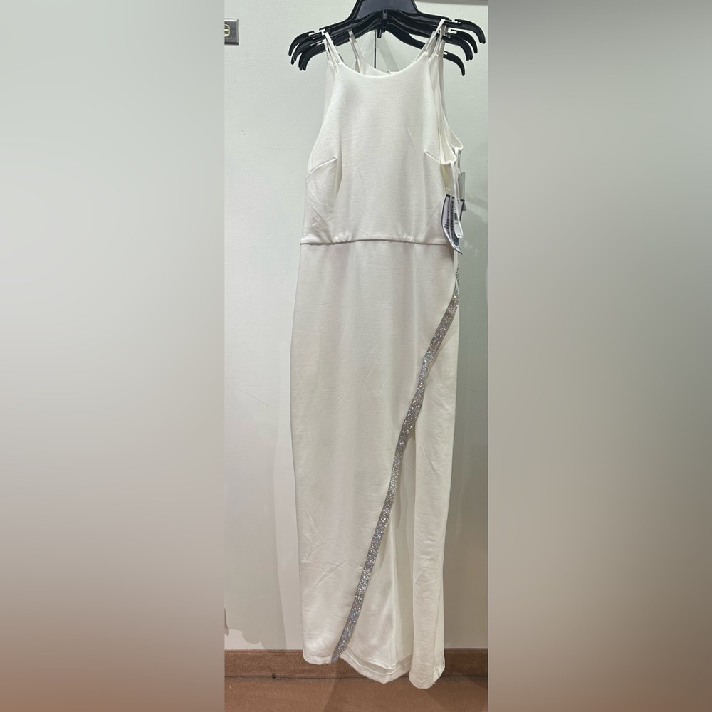 White dress with rhinestones on split